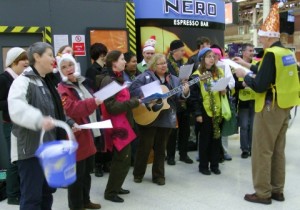 Pinkies carolling at Victoria Station in 2009